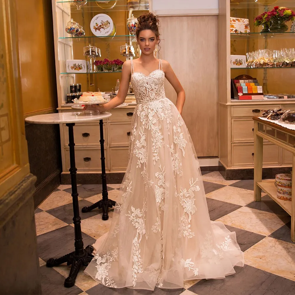 New Sexy Sweetheart Backless Spaghetti Straps A-Line Wedding Dresses Appliqued Beading Crystal Floor Length Bridal Gowns