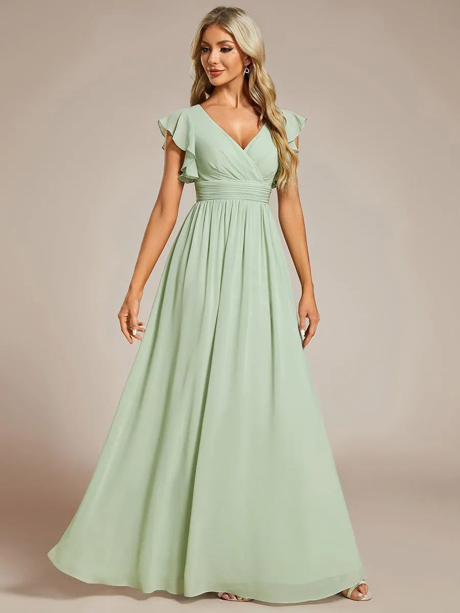 Robe demoiselle d'honneur en mousseline manches plissées avec découpe au dos